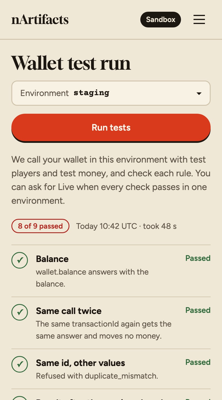 The wallet test run screen: eight of nine checks passed, one failed with what was expected.
